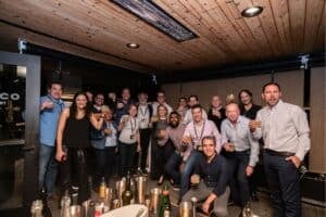 large group posing for photo at restaurant during private dining in chicago event
