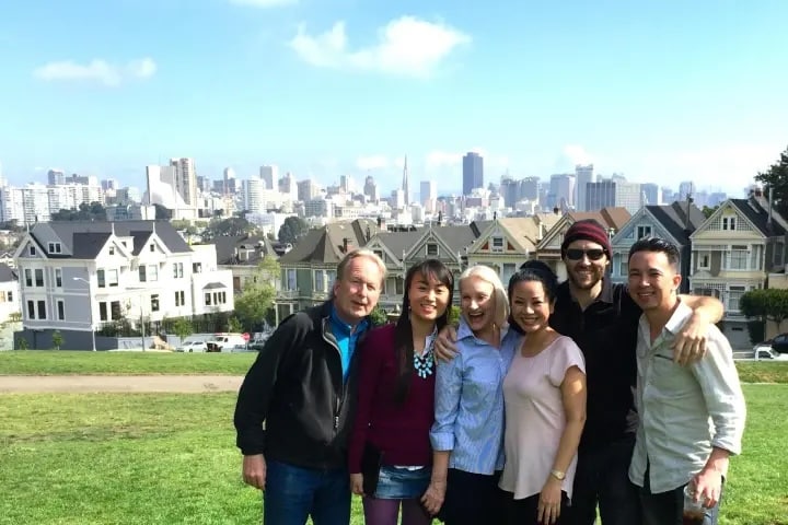 family with teenager posing for picture during san francisco movie tour