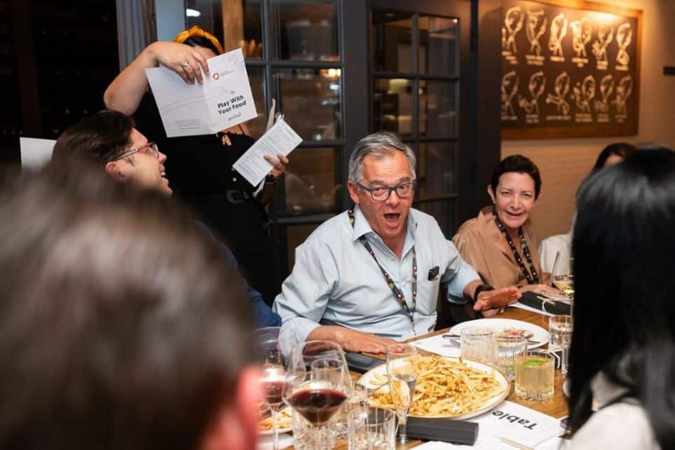 man laughing during avital interactive meal at one of the best private dining room san francisco ca