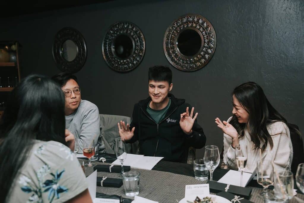 group laughing during private dining event in rino denver