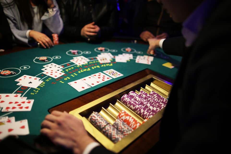 hands at casino table for corporate event