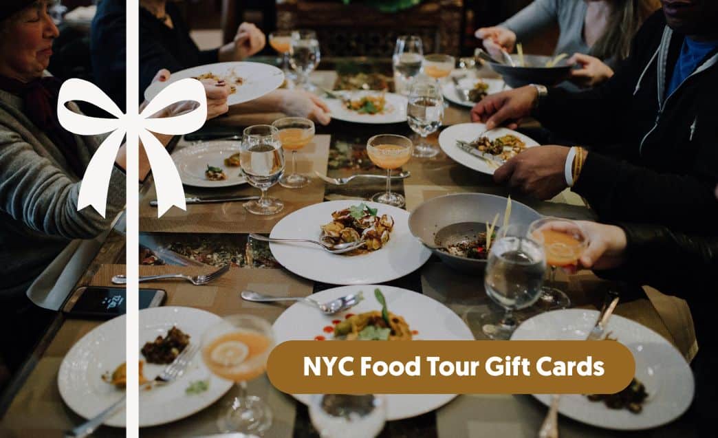 people eating with bow over the top of image and nyc food tour gift card text