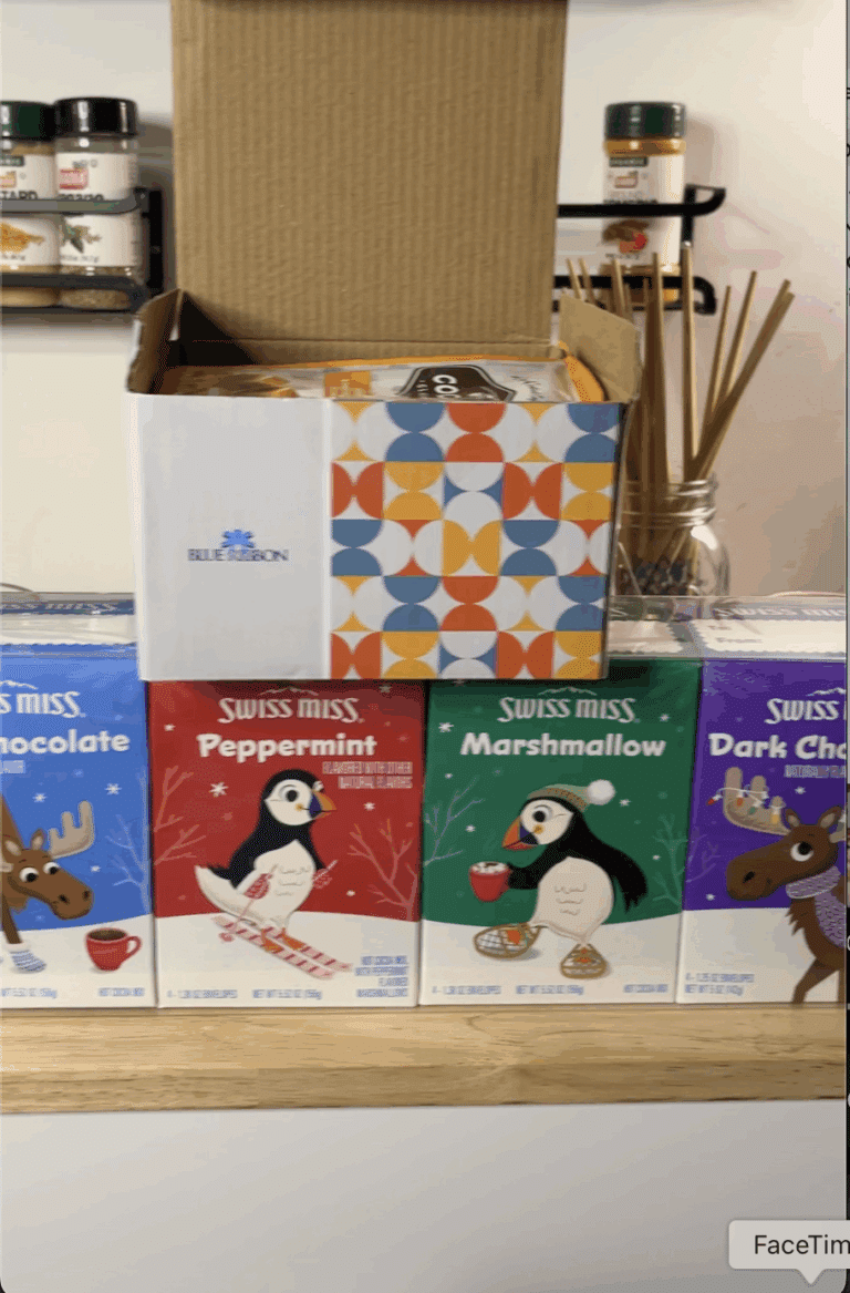 several hot chocolate boxes sitting on table for hot chocolate tasting