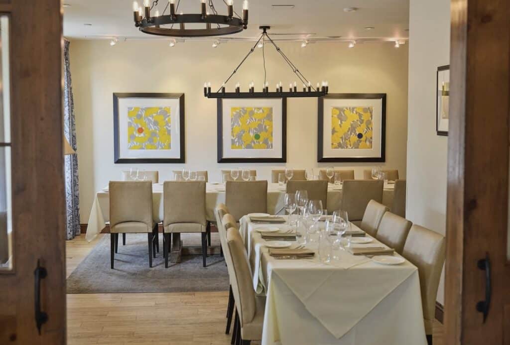A private room is set for guests at Bistro Du Midi In Boston