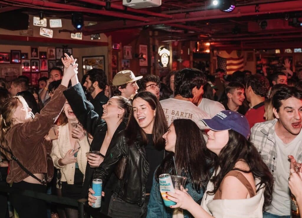 Friends dancing at Loretta’s Last Call in Boston