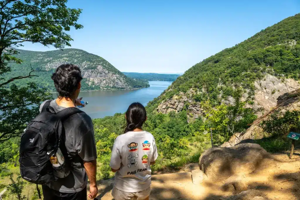 Friends take a hike in Flushing Meadows Corona Park in Queens