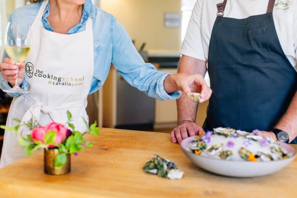 A beautiful plate of oysters is being prepared at a Cavallo Point cooking class