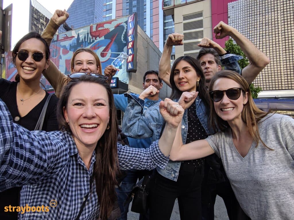 Coworkers pose on a Stay Boots scavenger hunt in Denver