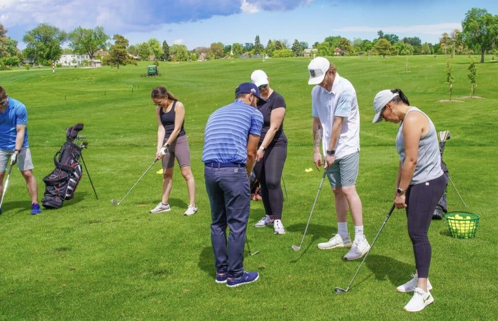 Friends Golfing at Willis Case Golf Course in Denver
