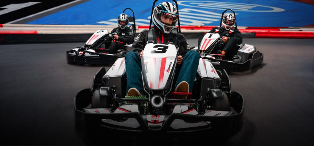 Riders compete on the K1 Speed go kart track