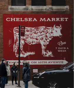 group standing in front of chelsea market during chelsea food tour