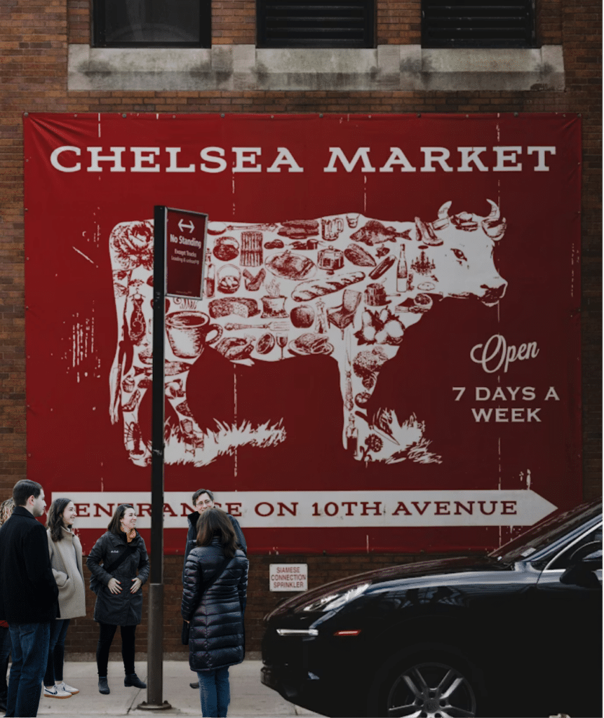 group standing in front of chelsea market during chelsea food tour