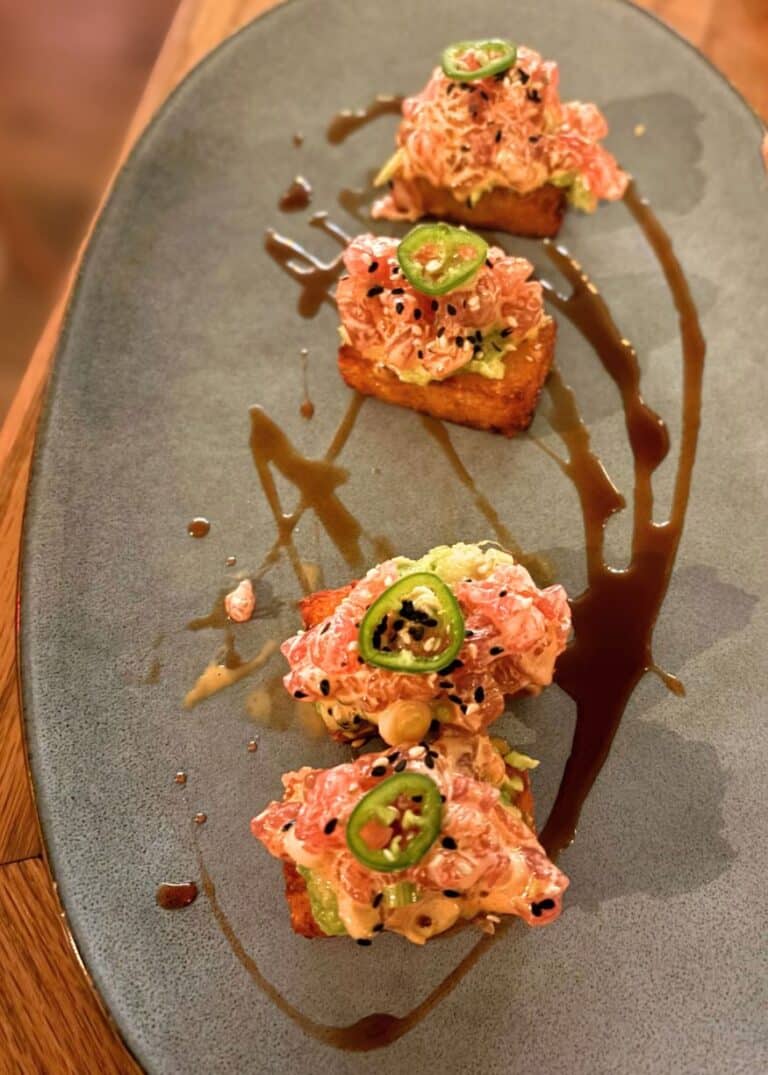 plate of crispy tuna rice served during nyc food tour with avital experiences