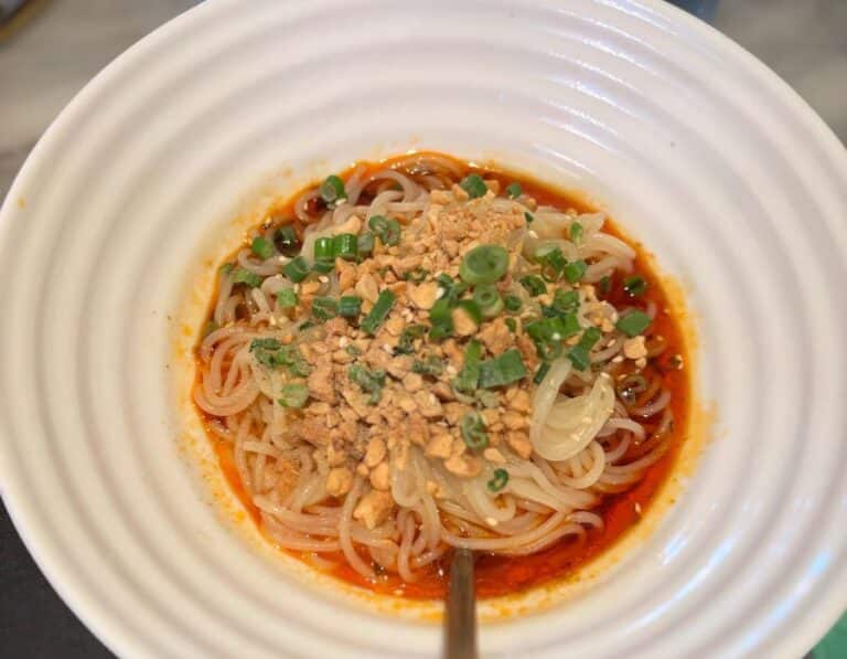 bowl of dan dan noodles served during chelsea market food tour