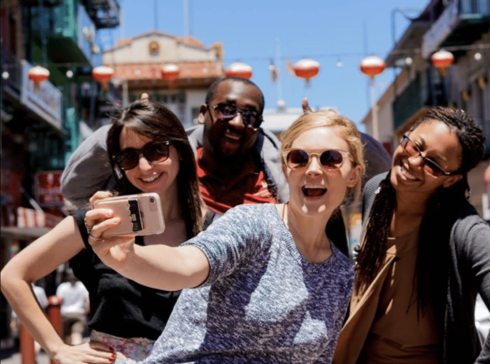 Friends pose for a selfie in Chinatown on a Stretchy Pants SF food tour