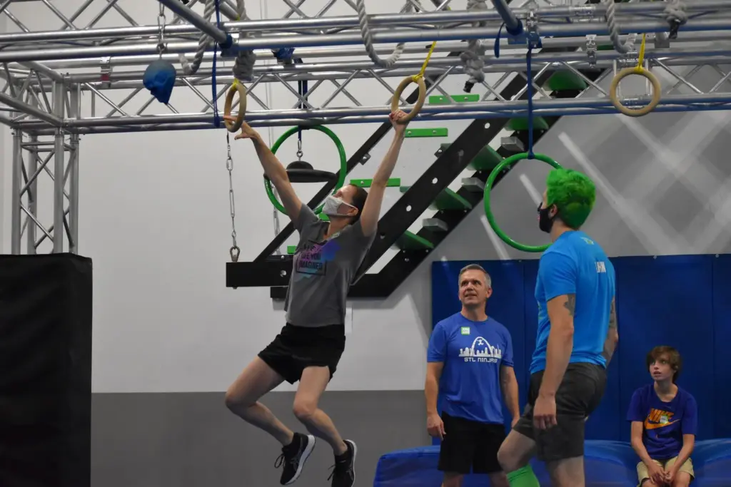 A team goes head to head at an athletic challenge at Ultimate Ninjas in Chicago