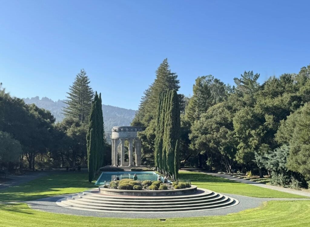The Pulgas Water Temple is in the background of a big verdant park