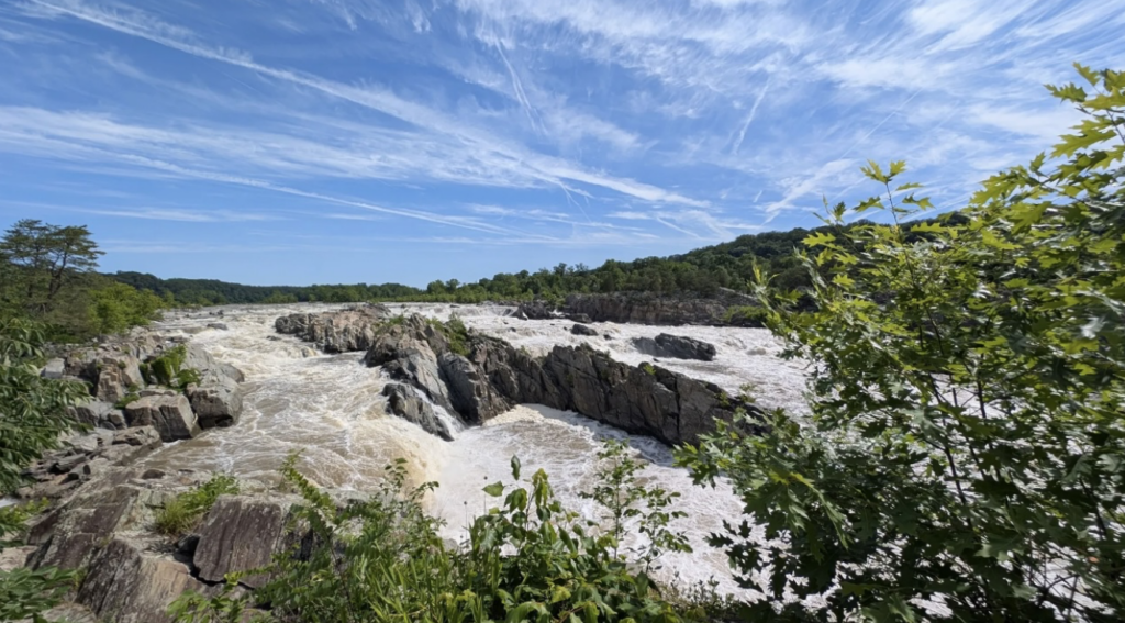 The River Trail in DC is rocky and verdant with blue skies above