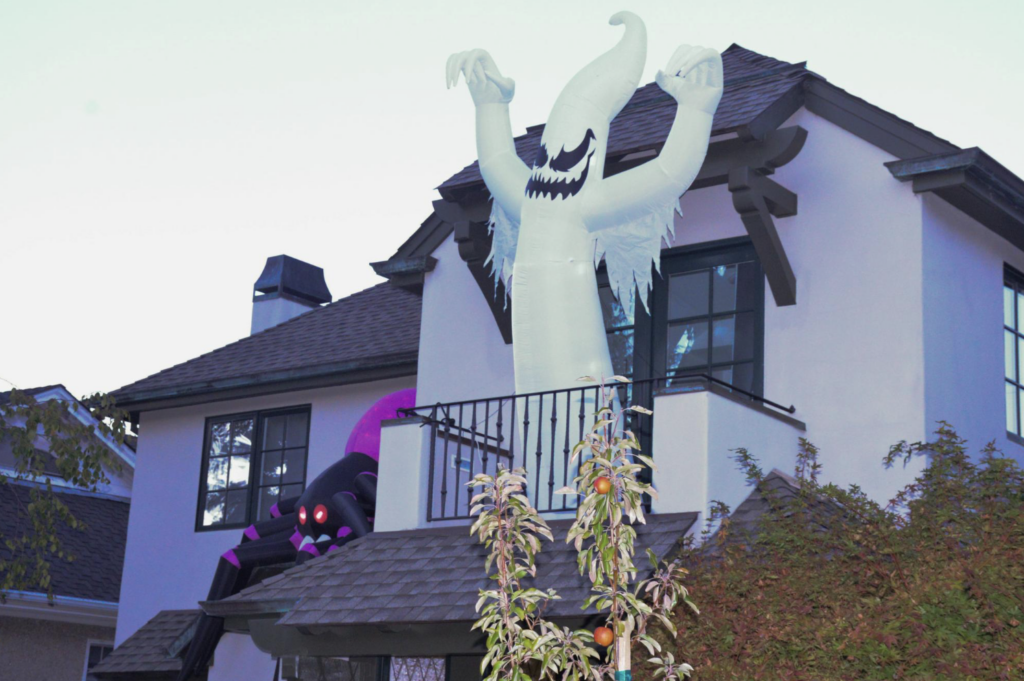 A spooky ghost decorates the front of a Burlingame house