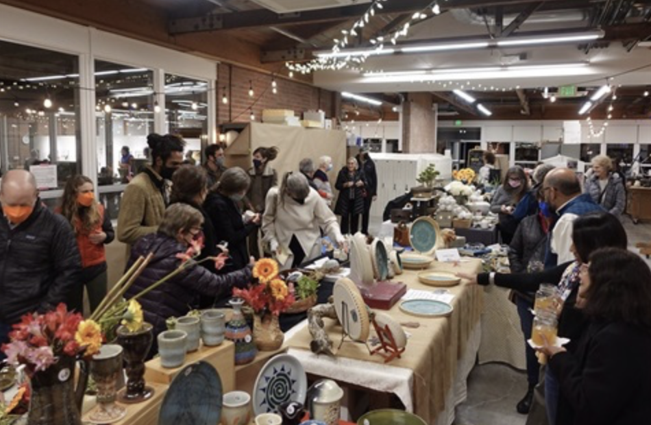 Palo Alto residents pour over wares at a holiday market