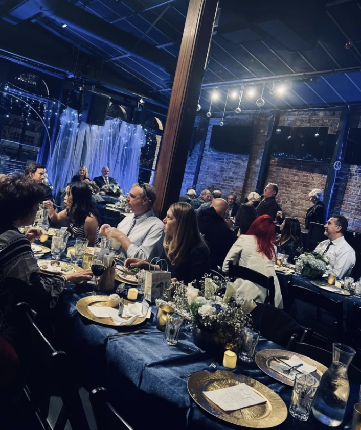 A dinner party at Loft SJ is decked out in velvet blue