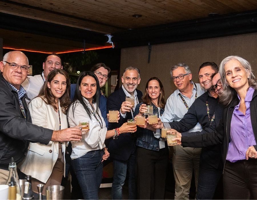 group posing during mingling hour with avital