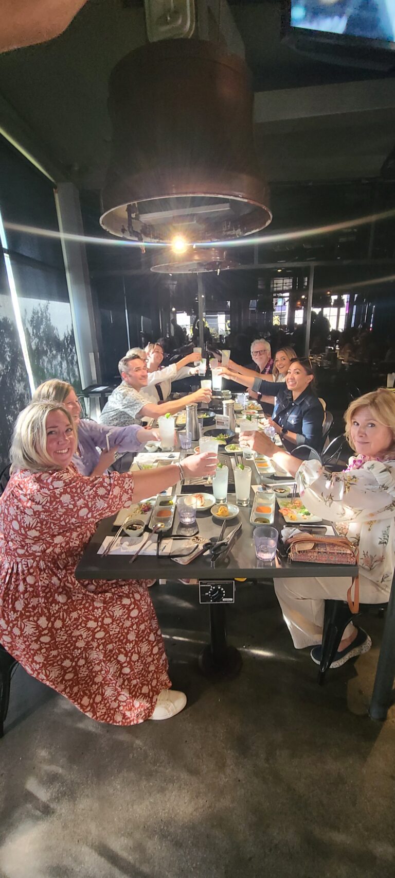 group toasting drinks during la food tour for team building