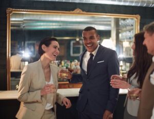 group standing at bar during interactive mingling hour