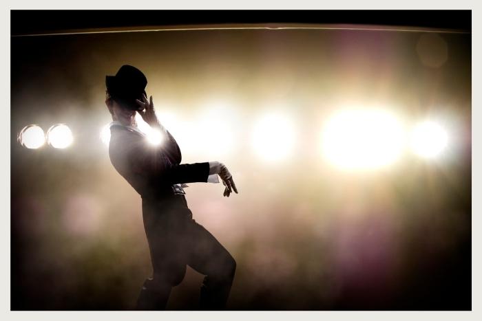 performer on stage during unique virtual event