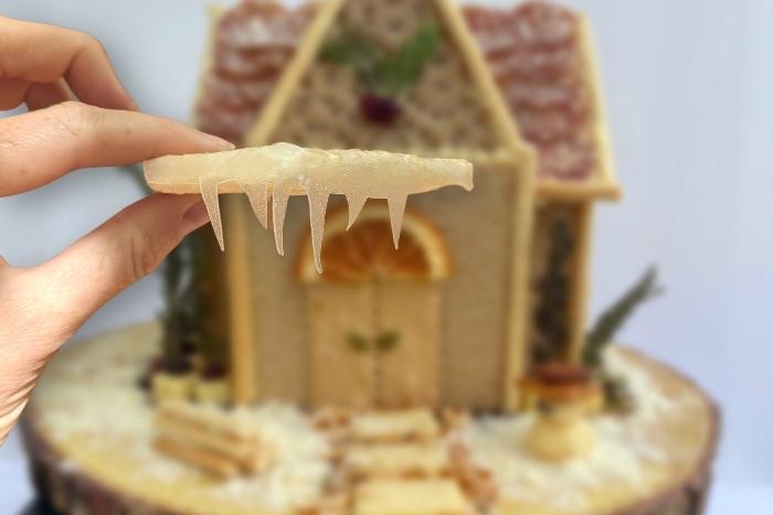 rice-paper-icicles-held-by-a-hand