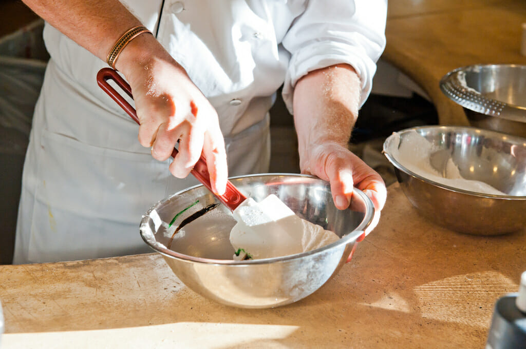 plan a corporate cooking class: Use Food to Boost Corporate Team Building Attendance